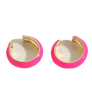 Hot pink enamel C-shaped hoop earrings with gold metal plating on a white background