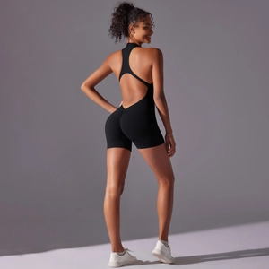 Close-up of backless halter yoga bodysuit featuring scrunch butt and high-stretch fabric