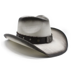 Detail of western straw cowboy hat with bull head buckle and leather studded band