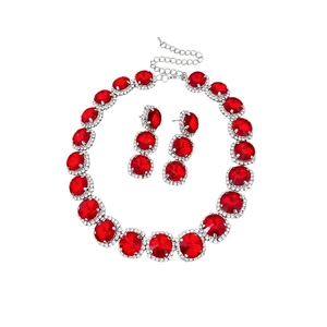 Vintage silver jewelry set with large red round stones and sparkling crystals