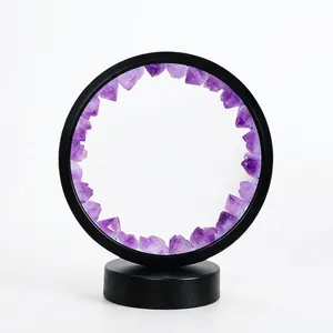 Natural amethyst crystal geode night light with round frame and black USB base stand