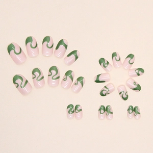 Pale pink press-on nails set with green wavy line designs in multiple sizes
