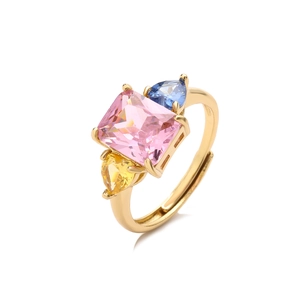 Detailed view of adjustable gold ring with pink square zircon and colorful side stones