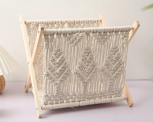 Close-up of Bohemian hand-woven cotton rope patterns on a wooden magazine rack