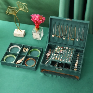 Deep green velvet jewelry box with double-layer storage and multiple compartments