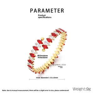 Detailed view of 18K gold plated stainless steel bangle with red and white rhinestones