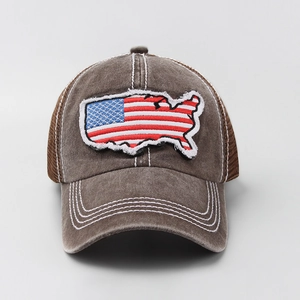 Close-up of USA map embroidery and mesh details on the vintage washed baseball cap