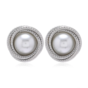 Elegant twisted silver rope earrings with central white pearls on a clean white background