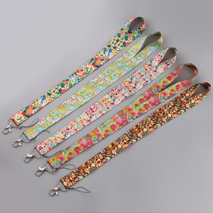 Detail of floral printed polyester lanyards with metal lobster clasps and phone loops