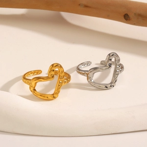 Irregular textured heart rings in gold and silver finish with lava texture detail