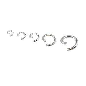 Five assorted sizes of silver 18K stainless steel open jump rings for DIY jewelry making