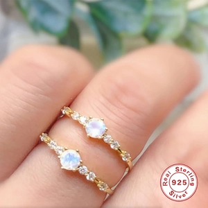 Elegant S925 sterling silver ring with a iridescent moonstone and sparkling side diamonds