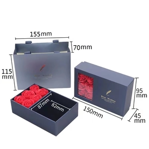 Navy blue jewelry gift box with red soap roses and matching shopping bag set