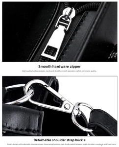 Detail of black leather bag showing smooth silver zipper and detachable strap hooks