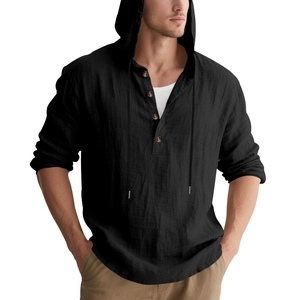 Close-up of linen hoodie shirt featuring buttoned neckline and textured black fabric