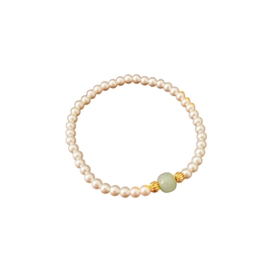 Elegant pearl bracelet with light green jade beads and golden pumpkin metal spacers