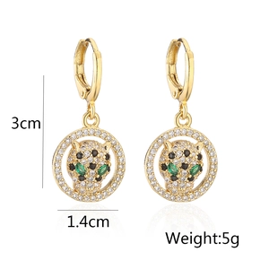 Detail view of leopard head earrings with dimensions 3cm by 1.4cm and 5g weight