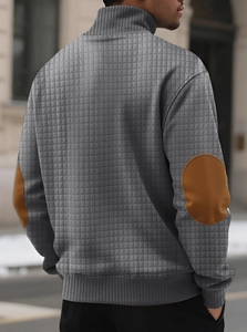 Men's grey waffle knit sweatshirt featuring contrast brown elbow patches and a stand collar