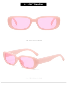 Detail view of jelly pink rectangular sunglasses with translucent plastic frame