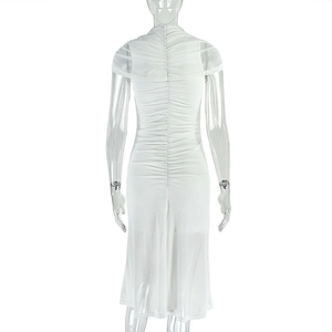 Detail of the white ruched design and slim fit silhouette on the back of the dress