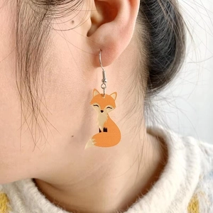 Cute orange acrylic fox earrings for women featuring asymmetrical animal stud design