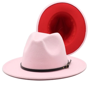 Detail of wool felt fedora featuring black leather band and red contrast inner brim