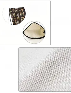 Detail of fine linen makeup bag with Egyptian gold prints and durable alloy zipper