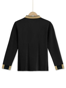 Close-up of waffle textured long-sleeve polo shirt with khaki plaid cuffs and collar