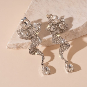 Sparkling silver fringe earrings with clear rhinestones and pear-shaped drop pendants