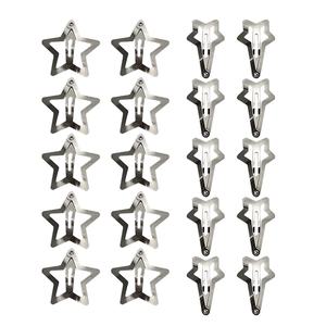 Detailed view of silver metal star hair clips and barrettes set in a grid layout