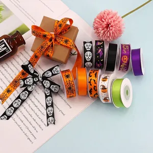 Halloween ribbon set featuring spiders and pumpkins for festive DIY gift wrapping