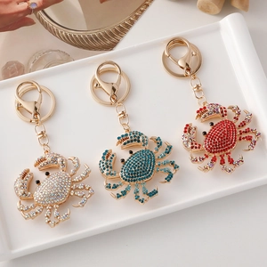 Colorful crab keychains with sparkling crystals on gold metal base for bag charms