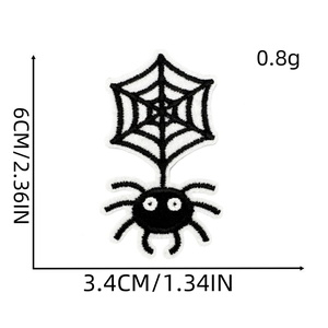 Detail of spider and web embroidery patch with 6cm x 3.4cm size specifications