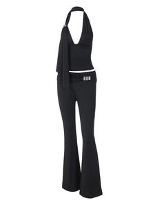 Women's black backless halter top and flared trousers set with silver metal buckles