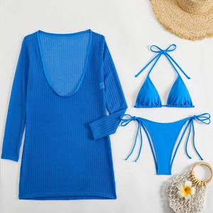 Three-piece royal blue bikini set with long sleeve mesh cover-up and beach accessories