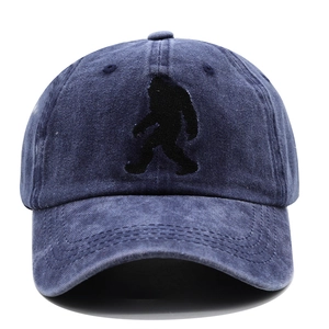 Classic washed navy cotton baseball cap with embroidered bigfoot silhouette for outdoors