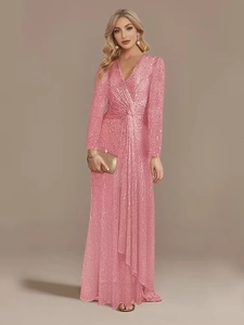 Close-up of pink sequin evening gown featuring V-neck design and ruched waist detail
