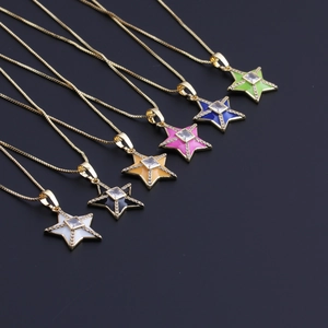 Macro detail of star pendants with colorful enamel and cubic zirconia in 18k gold plating