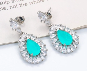 Vintage palace style long flower earrings with teal blue teardrop synthetic sapphire