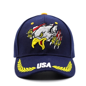 Dark blue baseball cap with eagle embroidery and white USA logo with wheat patterns