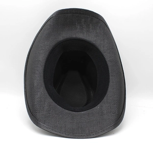 Detail view showing internal structure and fine texture of woven black jazz hat