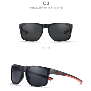 Detail view of KDEAM C3 black polarized sports sunglasses with orange temple accents