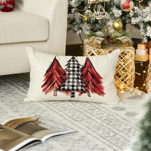 Detail of Christmas pillow cover with plaid and watercolor trees on cozy living room rug