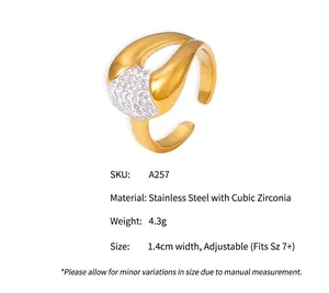 Detail of 18k gold plated titanium steel ring with sparkling Czech diamond inlay