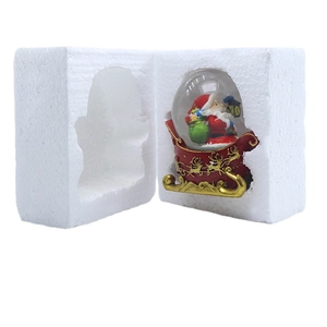 Christmas snow globe with Santa in red sleigh and protective foam packaging box
