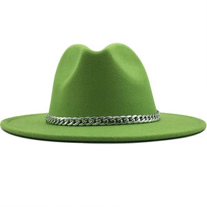 Detail of green felt wide brim Panama hat featuring a heavy silver metal chain band
