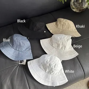 Lightweight breathable summer sun hats for women in five colors displayed on leather