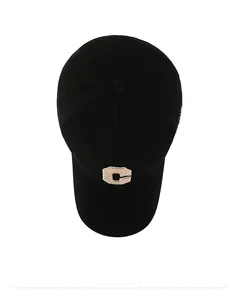 Top view of black cotton baseball cap showing detailed C letter embroidery and twill texture