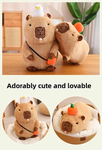Close-up of soft plush capybara toy with a small white bird and orange crossbody bag accessory