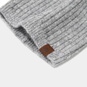 Chunky knit wool blend beanie in grey featuring a rustic snowflake faux leather patch
